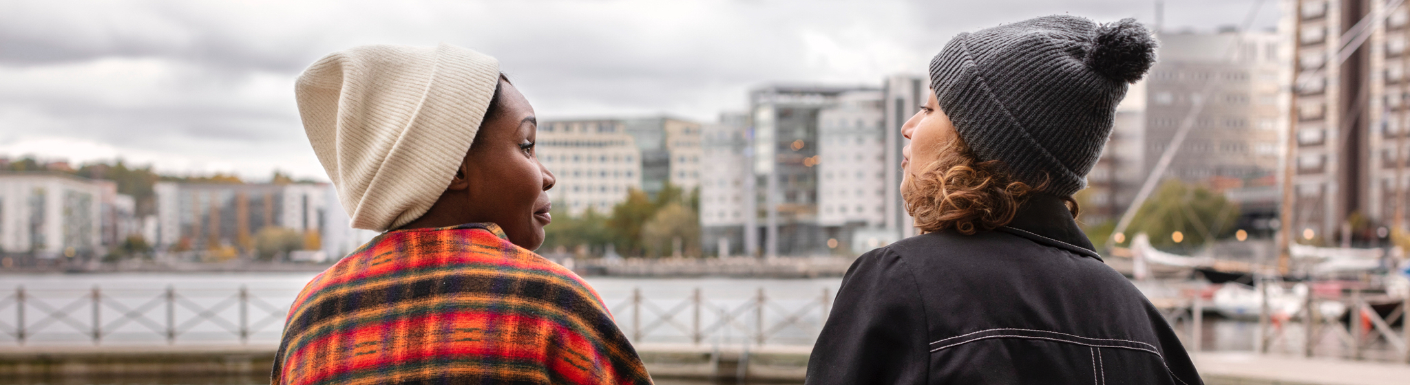 Two women engaged in conversation.