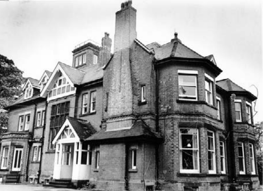 A grainy black and white photograph of the outside of Beechwood Children’s Home, taken in the mid-1980s